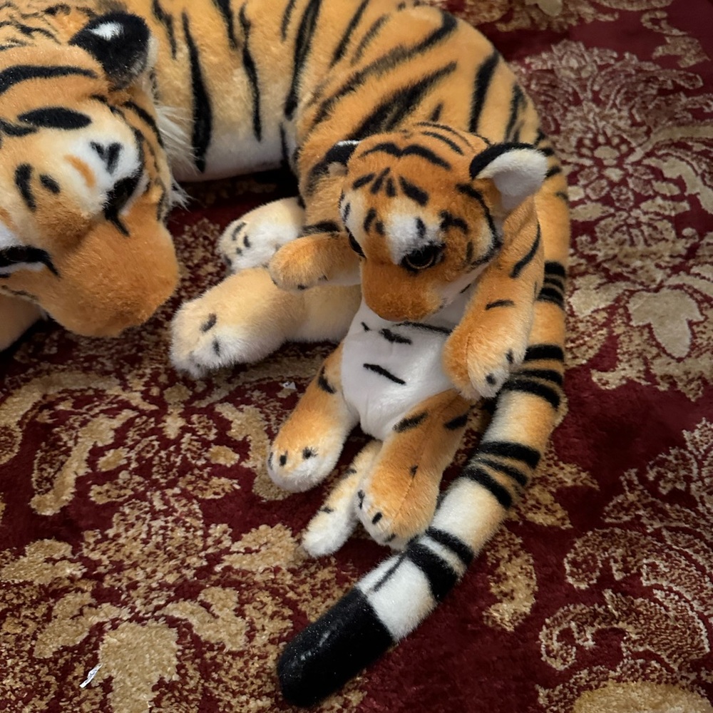 Stuffed tiger with cub. Beautiful